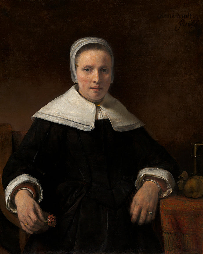 A Woman Holding a Pink by Rembrandt Harmenszoon van Rijn
