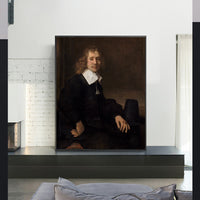 A Young Man Seated at a Table by Rembrandt Harmenszoon van Rijn