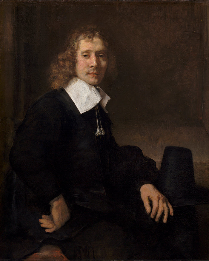 A Young Man Seated at a Table by Rembrandt Harmenszoon van Rijn