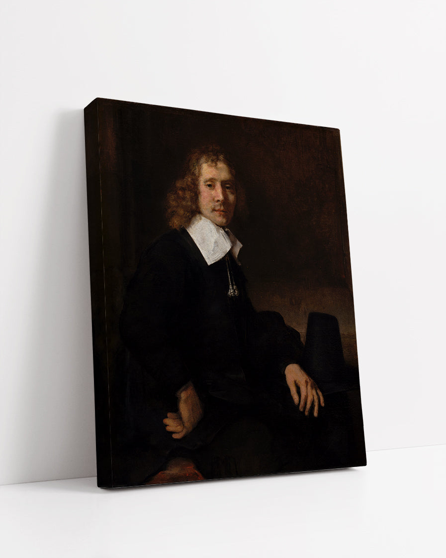 A Young Man Seated at a Table by Rembrandt Harmenszoon van Rijn