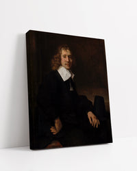 A Young Man Seated at a Table by Rembrandt Harmenszoon van Rijn
