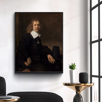 A Young Man Seated at a Table by Rembrandt Harmenszoon van Rijn