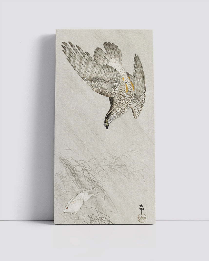Hawk hunting a hare by Ohara Koson