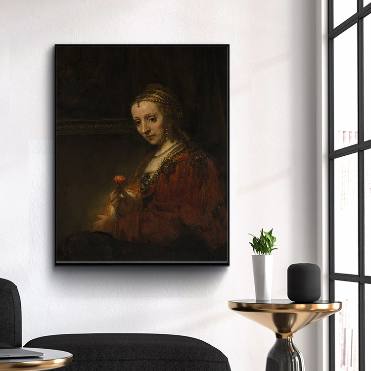 Woman with a Pink by Rembrandt Harmenszoon van Rijn