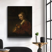 Woman with a Pink by Rembrandt Harmenszoon van Rijn