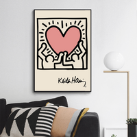 Men holding a heart by Keith Haring