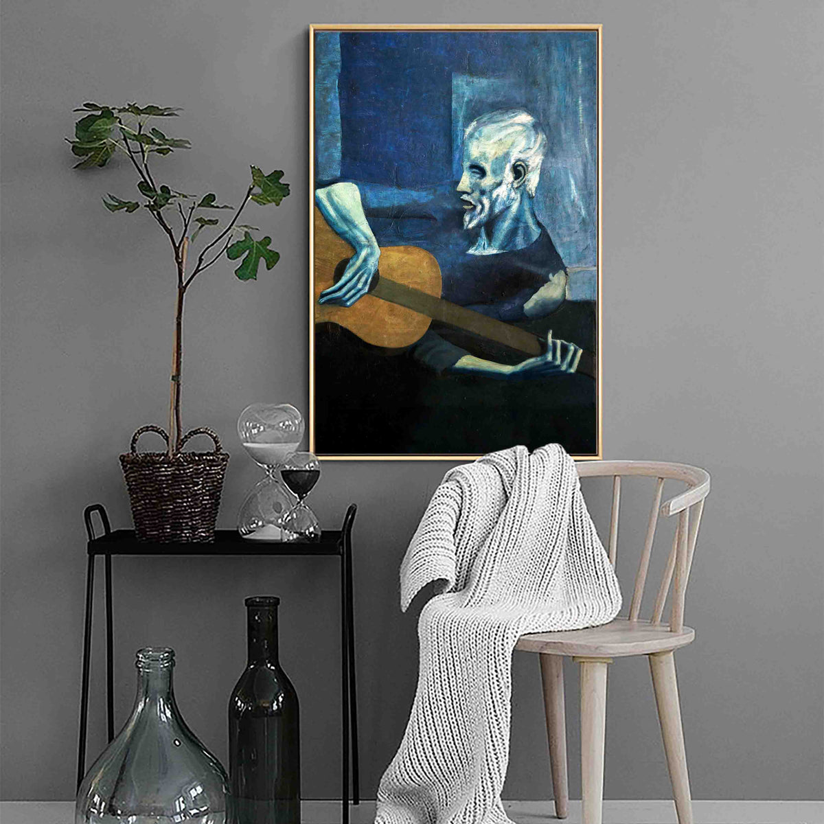 The Old Guitarist by Pablo Picasso