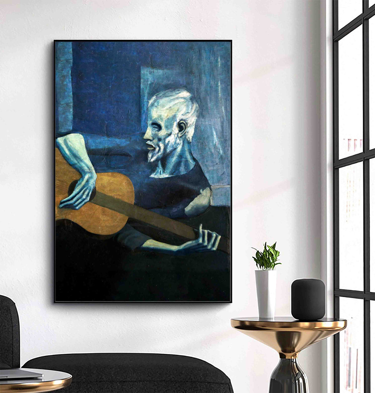 The Old Guitarist by Pablo Picasso