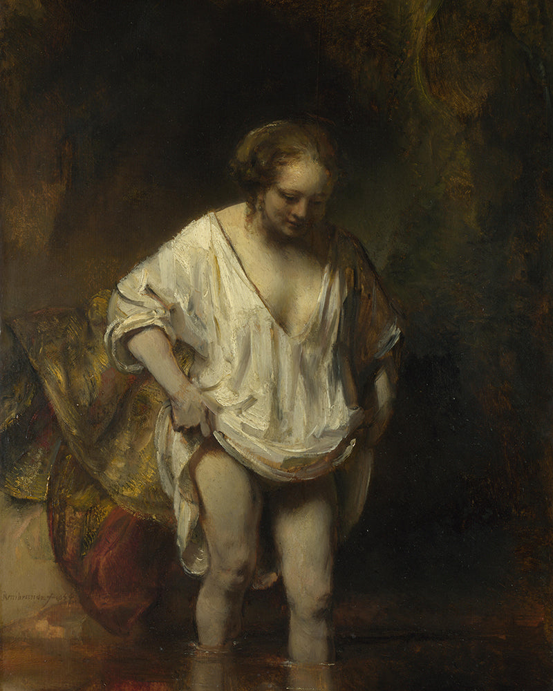 A Woman Bathing in a Stream  by Rembrandt Harmenszoon van Rijn