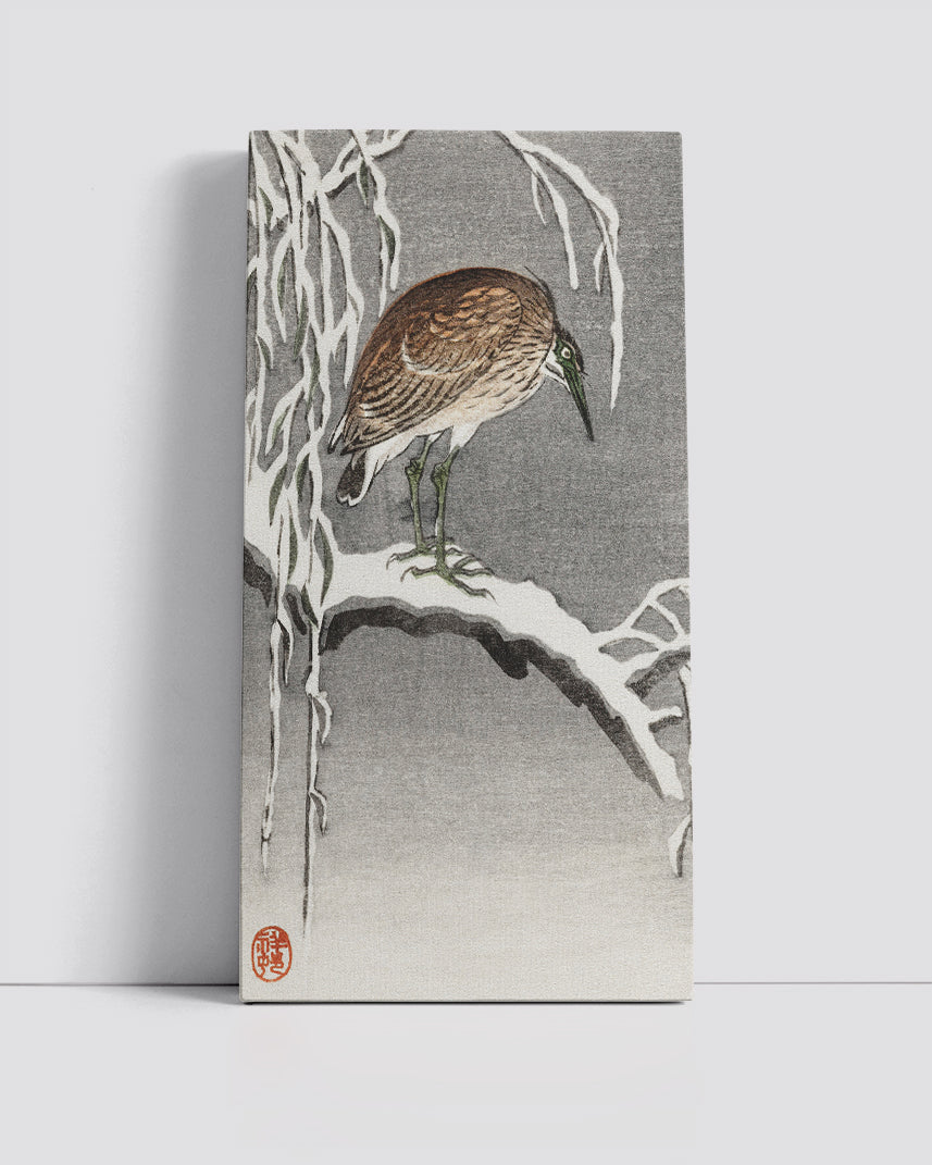 Heron on snowy tree branch by Ohara Koson