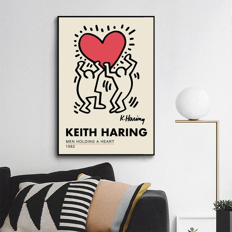 Men holding a heart by Keith Haring