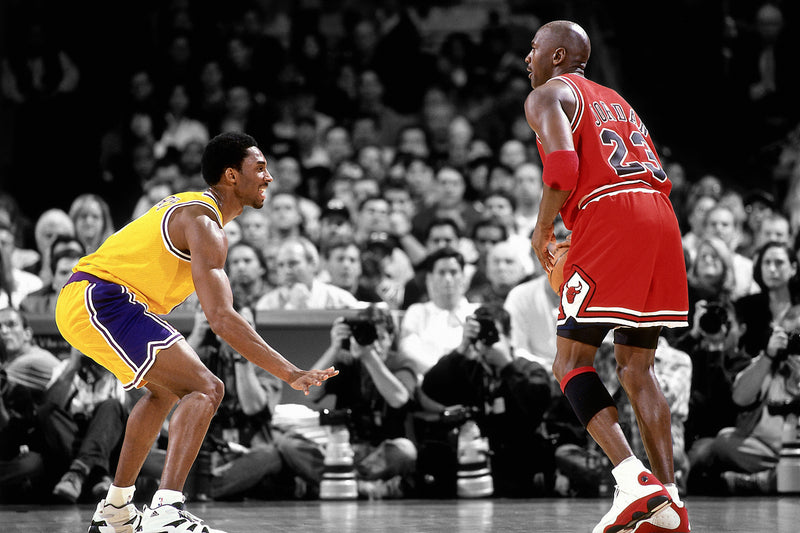 Kobe Bryant defends against Michael Jordan